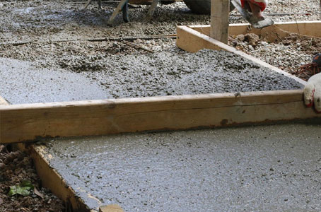 DES TRAVAUX DE DALLE EN BÉTON